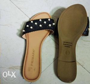 Pair Of Black-and-white Primark Slide Sandals