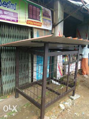 Pet Cage In Front Of Store