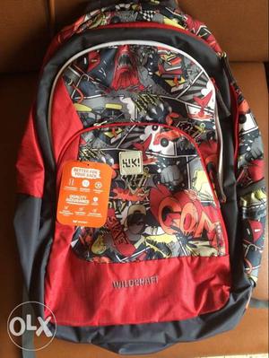 Red And Multicolored Wildcraft Backpack