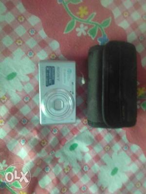 Silver Sony Digital Camera With Bag