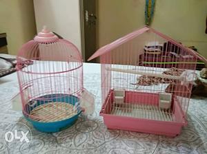 Two Pink Bird Cages