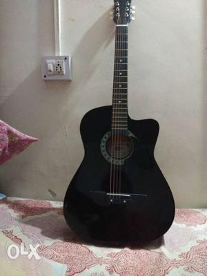 Black Acoustic Guitar with cover