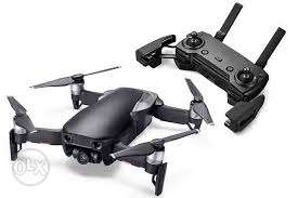 Black And Gray Quadcopter Drone With R/C