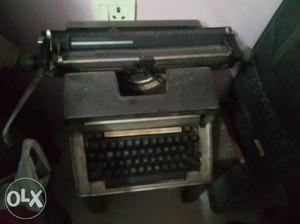 Black And Gray Typewriter With Case