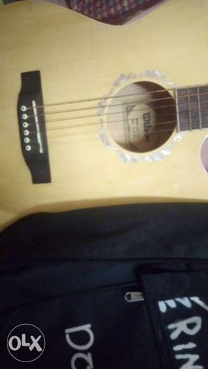 Brown Acoustic Guitar With Gig Bag