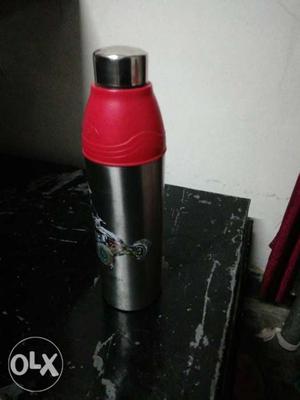 Cylindrical Red And Gray Stainless Steel Vacuum Flask