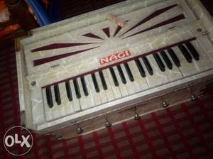 Gray And Red Nagi Upright Piano