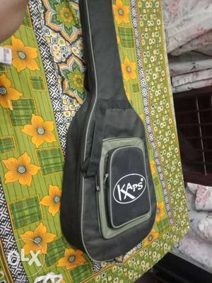 Guitar with Black KAPS Guitar Bag