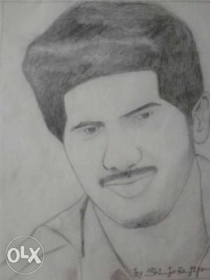 Pencil drawing of dulquer salman on paper by