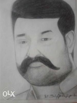 Pencil drawing of mohanlal on paper by artist