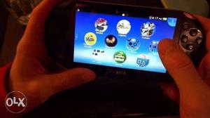 Person Holding Game Handheld Game Console
