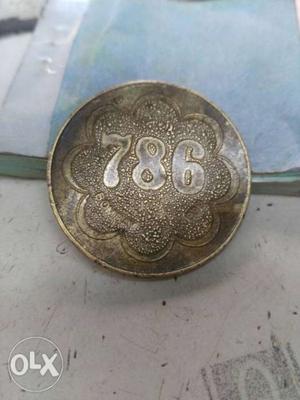 Round Gold-colored 786 Coin