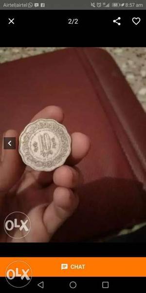 Round Silver-colored Commemorative Coin Screenshot