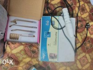 White Nintendo Wii Console With Controller And Game Cases