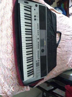 Yamaha PSR-I455(Keyboard) with red cover and