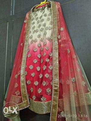 Beige and red colour Lehnga