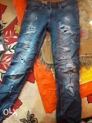 Distressed Blue-washed Jeans