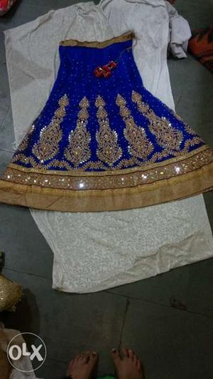 New blue colour bridal lehnga with golden colour