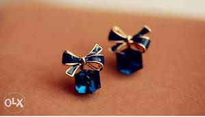 Pair Of Blue Jeweled Gold-colored Earrings