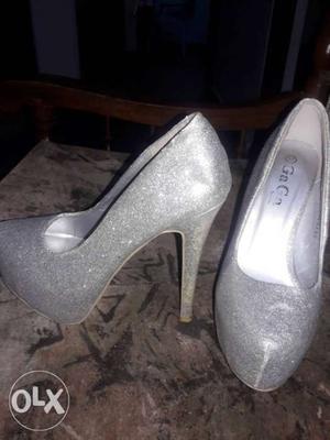 Pair Of Gray Round-toe Heeled Shoes