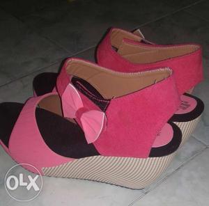 Pair Of Red-and-black Wedge Sandals