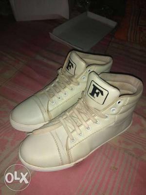 Pair Of White Converse All Star High-top Sneakers