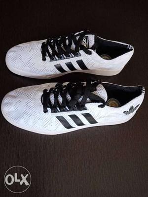Pair Of White-and-black Adidas Running Shoes
