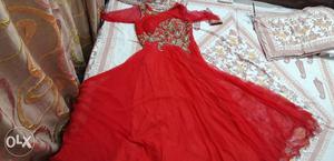 Red netted partywear gown. Worn 2 times.