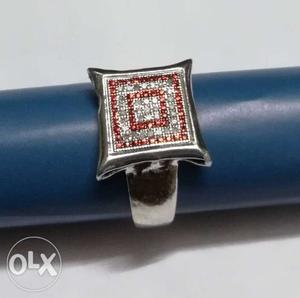 Silver-colored And Red Gemstone Encrusted Ring