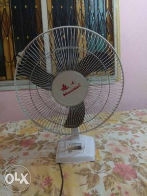 Table fan of Koolin brand in running condition