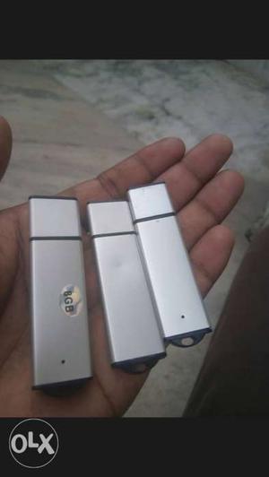 Three Gray 8 GB Flash Drives