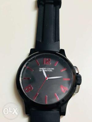 UCB watch with black silicon strap