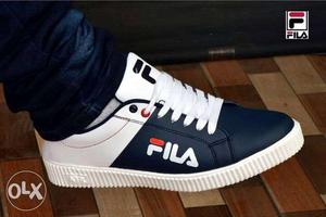 Unpaired Black And White FILA Low-top Shoe