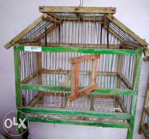 Green And Brown Wooden Cage
