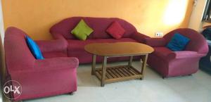 2 Pink Fabric Padded Sofa Chairs wid glas table urgent