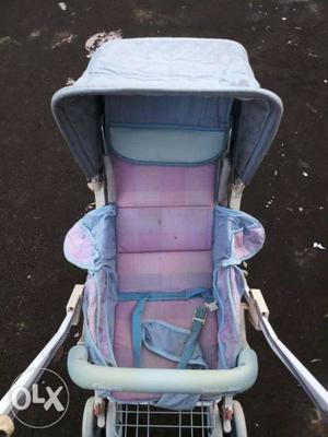 Baby's Gray And Purple Stroller