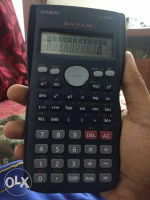 Black Texas TI-89 scientific calculator with memory chip