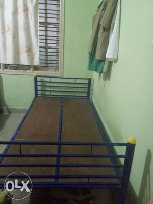 Blue And Brown Metal Bed Frame
