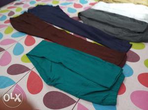 Blue, Black, And Green Pants