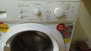 Fridge/White Front-load Washing Machine