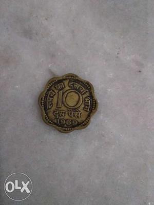 Gold-colored 10 Indian Coin