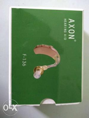 Gold-colored Axon Hearing Aid NEW NEVER USED
