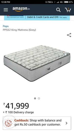 Gray And White Quilted Mattress