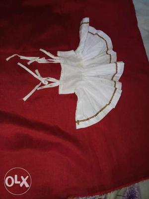 Newborn baby's frock from Homemade white color is