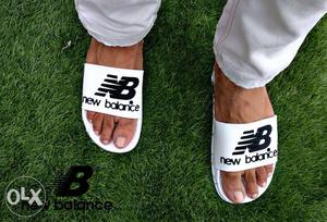 Pair Of White New Balance Slide-on Sandals