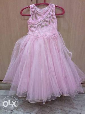 Pink colour sleeveless long frock for kids size