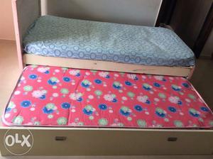 Pull out double bed with storage along with two