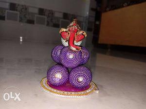 Red, White, And Purple Ganesha Decor