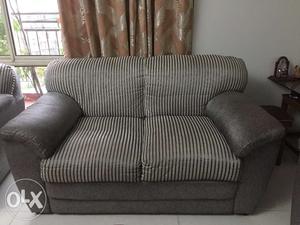 Seven seater (3+2+2) sofa for sale. Grey and gold