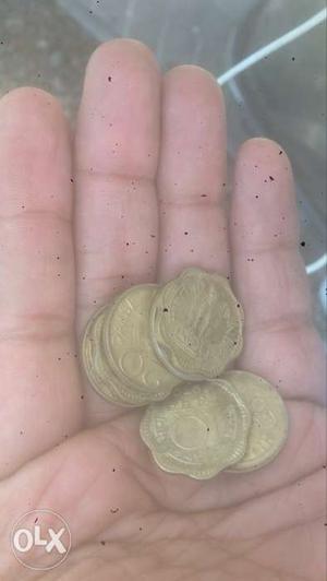 Several Round Gold-colored Coins